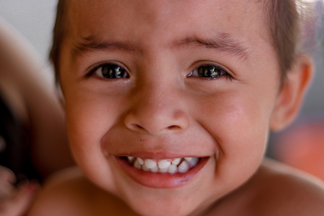 Smiling young boy ready for his back-to-school dental checkup