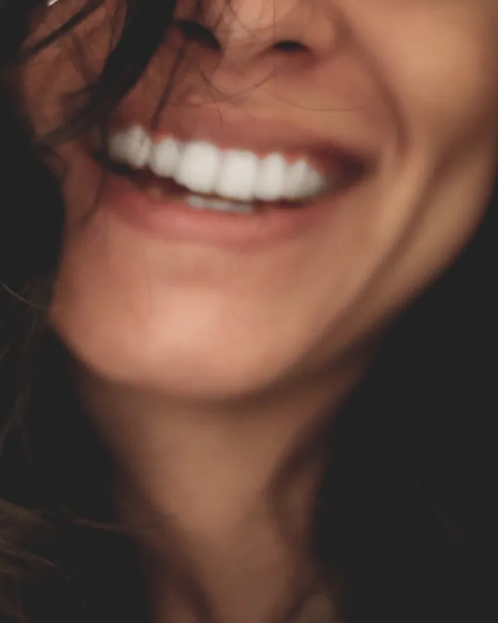 Confident, fresh smile after chronic bad breath treatment at Peninsula Dentistry in Huntington Beach