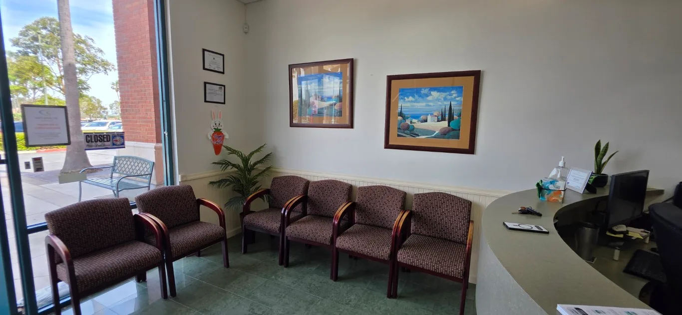 Comfortable waiting room at Peninsula Dentistry in Huntington Beach designed to put anxious patients at ease